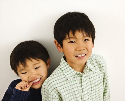 Two young Asian brothers portrait.