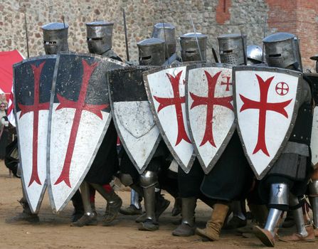 Knights in an armour and with the weapon, going to fight