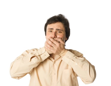 Man covering his mouth with hands, white background