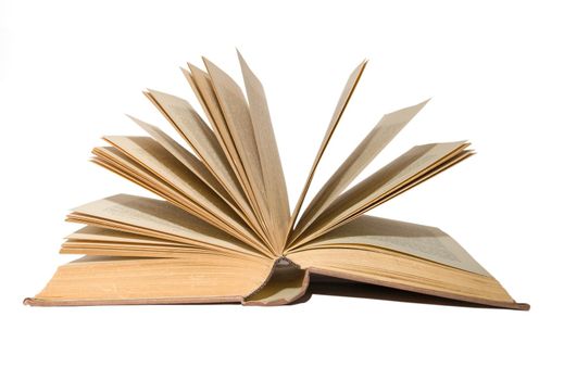An old brown book, isolated over white