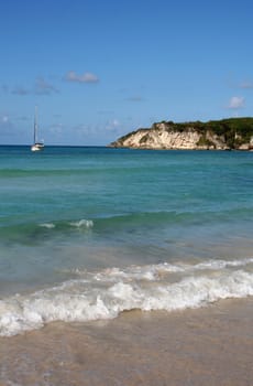 A sailboat docked at a tropical beach, near Punta Cana Dominican Republic.
