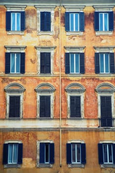 Vintage windows of an old italian building