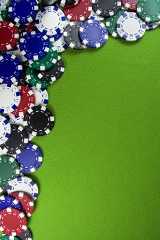 Many color poker chips on casino table