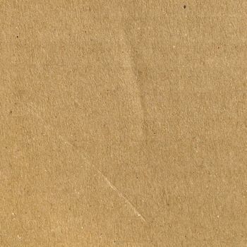 Brown corrugated cardboard sheet background material texture