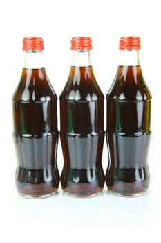 Cola bottles isolated against a white background