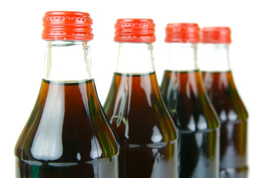 Cola bottles isolated against a white background