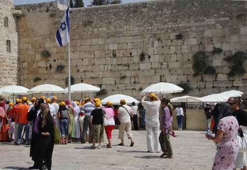 Tourists at the Wailing wall in Jerusalem 