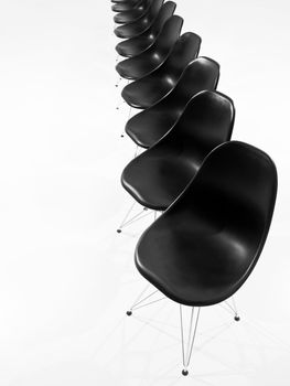 Black Chairs in a row isolated on white background