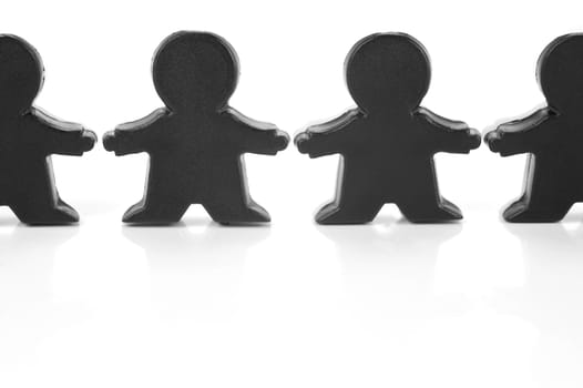 Miniature figurines isolated against a white background