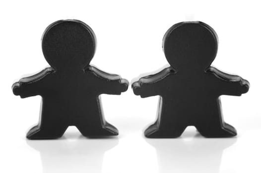 Miniature figurines isolated against a white background