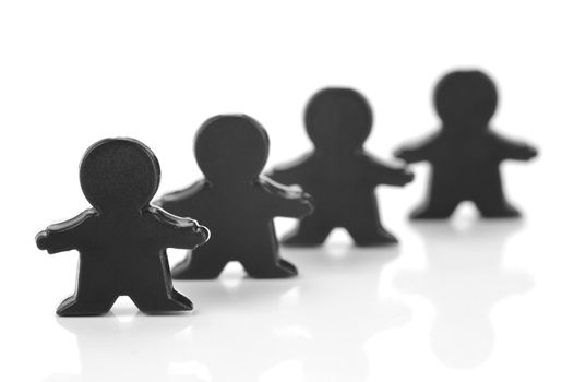 Miniature figurines isolated against a white background