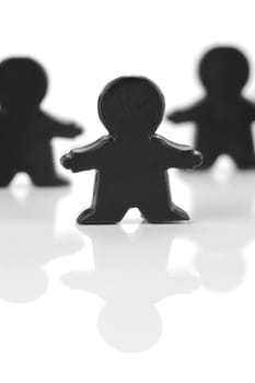 Miniature figurines isolated against a white background