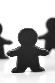 Miniature figurines isolated against a white background