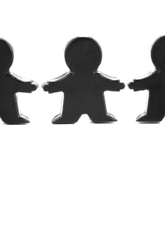 Miniature figurines isolated against a white background