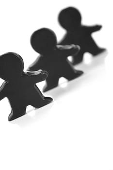 Miniature figurines isolated against a white background