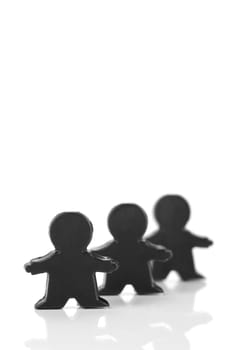 Miniature figurines isolated against a white background