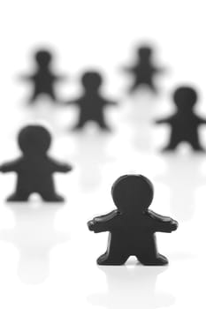 Miniature figurines isolated against a white background