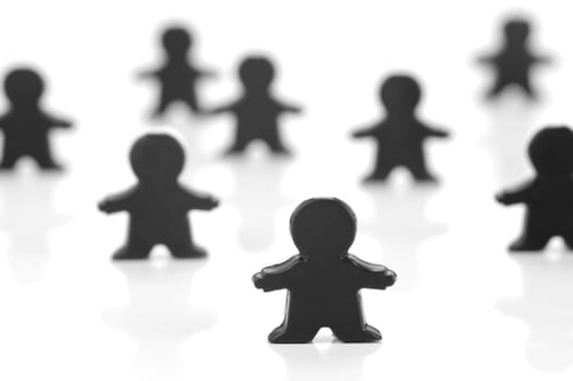Miniature figurines isolated against a white background