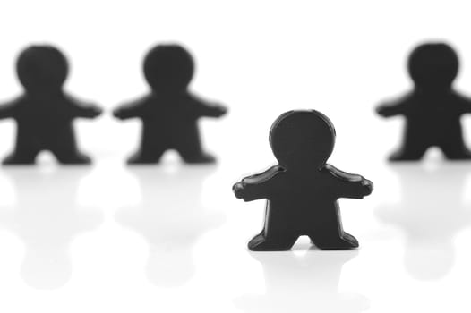 Miniature figurines isolated against a white background