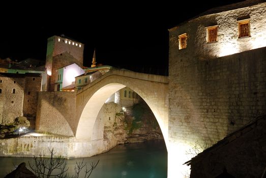 Old Bridge in Mostar at night reconstructed in 2003 after the original from 1556.