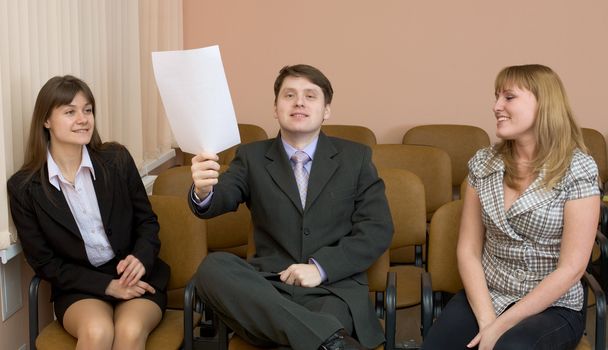 The people in a hall at conference