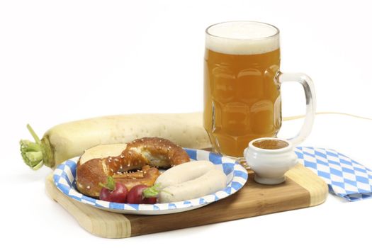 Bavarian veal sausage with mustard, pretzel and beer