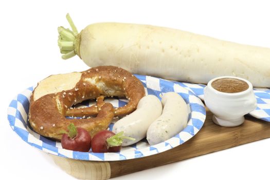 Bavarian veal sausage with mustard, pretzel and radish