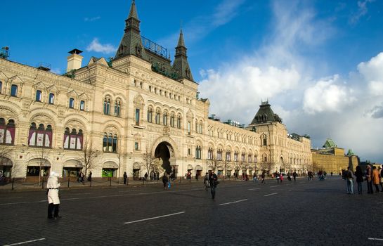 People walk on red square near GUM