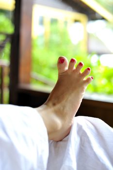 Reflexology foot massage, spa foot treatment
