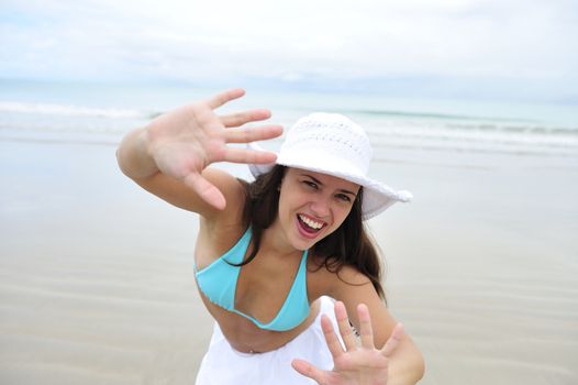 Pretty woman enjoying the beach in Brazil