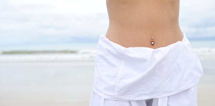 Woman enjoying her holiday in the beach in Brazil
