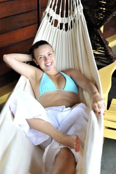 Woman relaxing in an hammock
