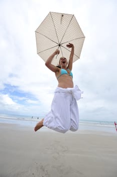 Woman enjoying her holiday in the beach in Brazil
