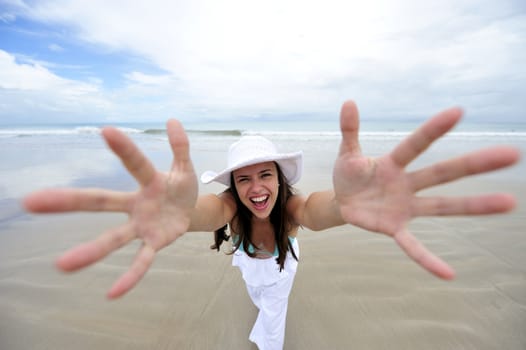 Woman enjoying her holiday in the beach in Brazil
