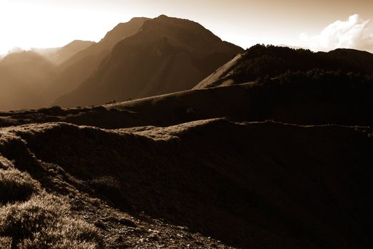 Strong light high mountain landscape in fall.