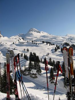 Skis, Ski poles and a view of the French Alps