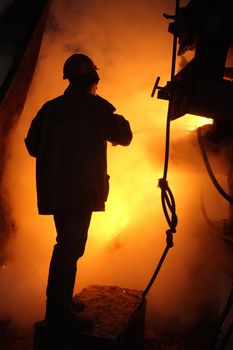 Hot work of steel maker in helmet