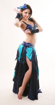 girl in blue dancing in arabian style