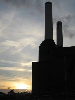 Battersea Power station at sunset, in sillohuette