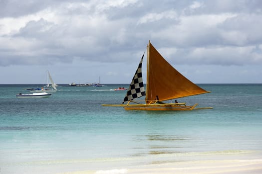 Sailing boats at an open ocean