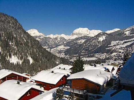 A view looking down a Ski village in a Valley in the Alps