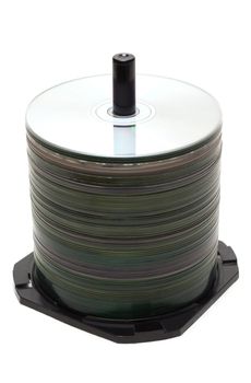 Pile CD disk on spindel insulated on white background