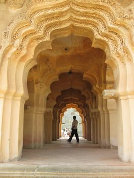 An arched corridor in the Lotus Mahal, Hampi.