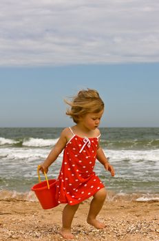 people series: little girl are run on the beach