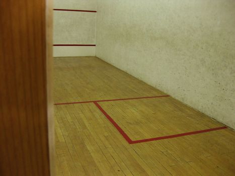 An Empty squash court. 