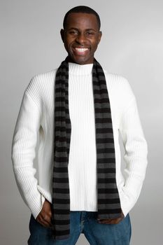 Smiling black man wearing scarf