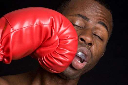 Boxing man getting punched