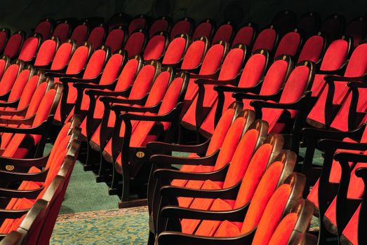 Series of theatrical chairs in the auditorium