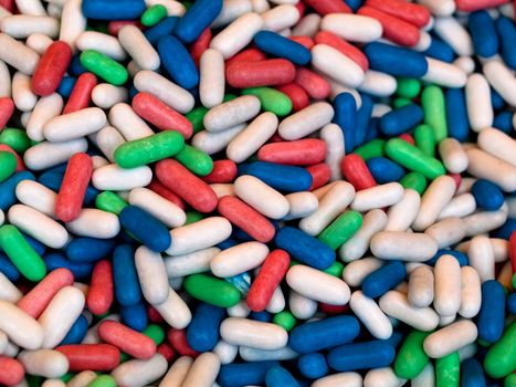 Bunch of multicolored candy pills