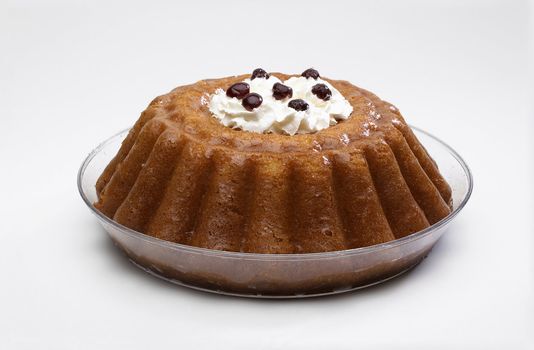 Babà Neapolitan with cream and black cherry